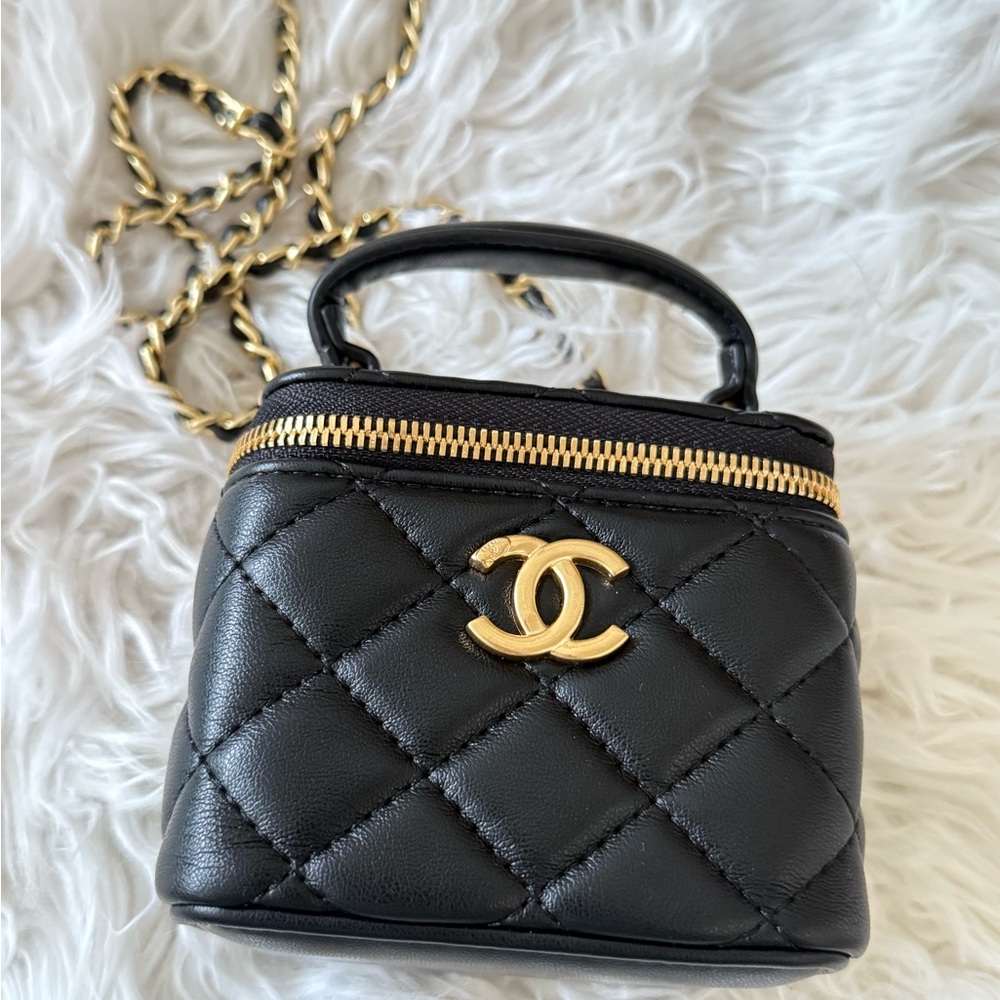 Chanel Black Quilted Mini Bag with Gold Accents